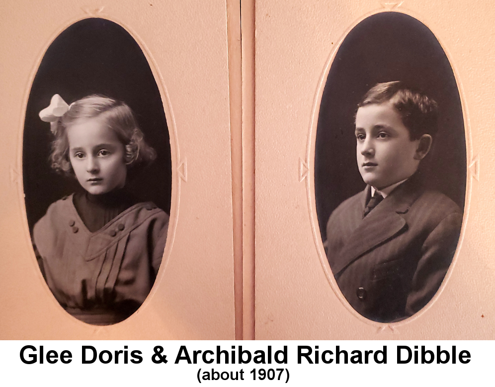 IMAGE/PHOTO: Glee Doris & Archibald Richard Dibble (about 1907): Side-by-side sepia-toned portrait photographs, matted in pink oval frames, of a little girl with a white ribbon in her hair, and a young boy wearing a pin-striped double-breasted suit.